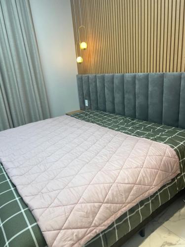Ένα ή περισσότερα κρεβάτια σε δωμάτιο στο Sobrado no esperança da comunidade