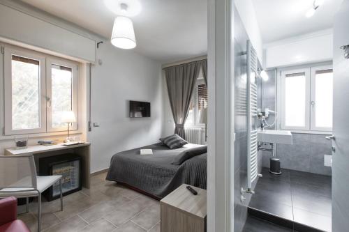 Postel nebo postele na pokoji v ubytování B&B Civico 1