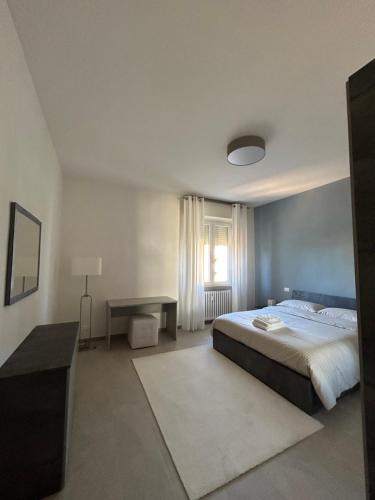 Postel nebo postele na pokoji v ubytování APPARTAMENTO PANORAMA