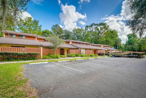 an empty parking lot in front of a building at Waterfront Dunnellon Retreat with River Access! in Dunnellon