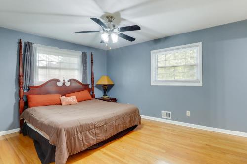 a bedroom with a bed and a ceiling fan at Quiet Decatur Home with Patio 13 Mi to Dtwn Atlanta! in Decatur