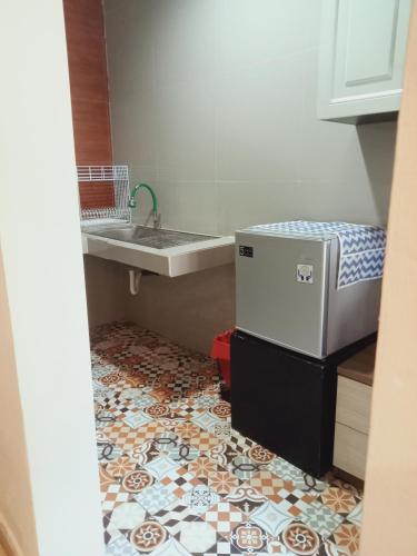 Kuchyň nebo kuchyňský kout v ubytování Buratwangi Tropis House