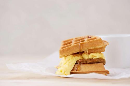 a sandwich cut in half on a piece of paper at Drury Inn & Suites Huntsville Space & Rocket Center in Huntsville