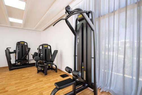 a gym with two treadmills and a treadmill at Radisson Blu Resort Al Hoceima in Al Hoceïma