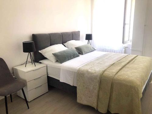 Postel nebo postele na pokoji v ubytování Apartment in Primosten - Sibenik Riviera 35564