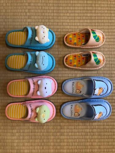 a group of toy shoes sitting on a table at オーシャニア一宮 in Ichinomiya