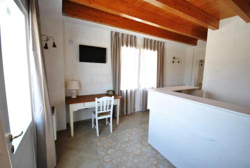 Gallery image of Tenuta Kyrios Agriresort Restaurant & Pool in Borgagne