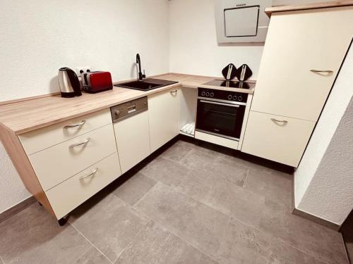 Dapur atau dapur kecil di Gemütliche Wohnung in Leverkusen
