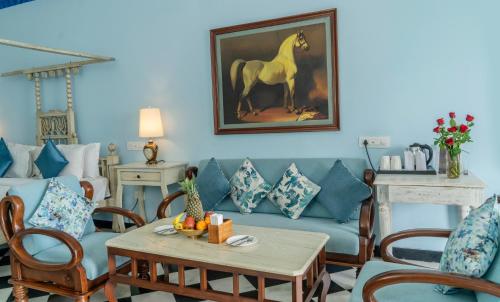 Zona de estar de Swaroop Vilas - Lake Facing Boutique Hotel