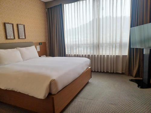 Una cama o camas en una habitación de Migliore Hotel Seoul Myeongdong