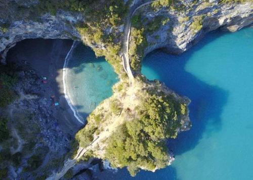 an aerial view of a island with blue water at Relax in Casa Domi in Scalea