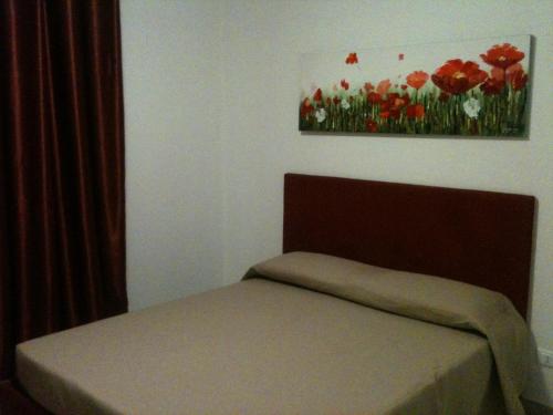 Postel nebo postele na pokoji v ubytování Appartamento Anna Maria