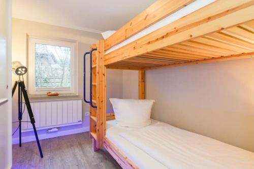 Postel nebo postele na pokoji v ubytování Haus Bene- Vivere Bungalow