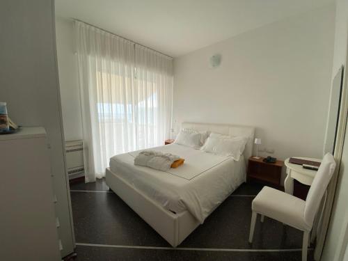 Letto o letti in una camera di Hotel Internazionale