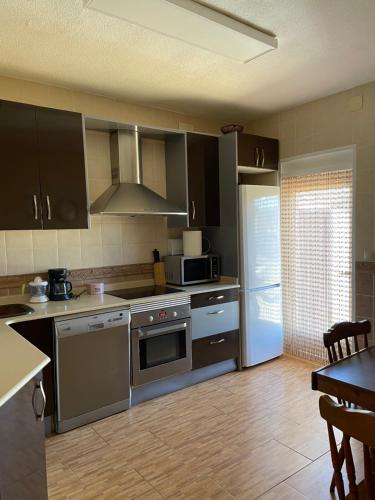 Η κουζίνα ή μικρή κουζίνα στο Casa La Pradera Cañete