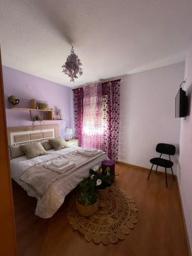 Ένα ή περισσότερα κρεβάτια σε δωμάτιο στο Casa La Pradera Cañete
