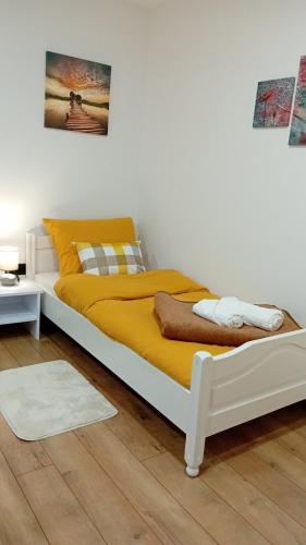 Postel nebo postele na pokoji v ubytování Apartman Katarina