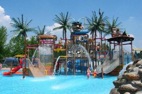 a water park with a bunch of water slides at Aparthouse SUPREME with Terme Catez Swimming Pools Tickets in Čatež ob Savi