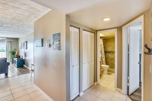 a hallway with a bathroom and a toilet at Bayshore Yacht & Tennis 216 in Clearwater Beach