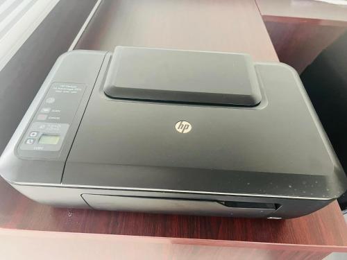 a printer sitting on top of a shelf at TRMOTEL in Matola