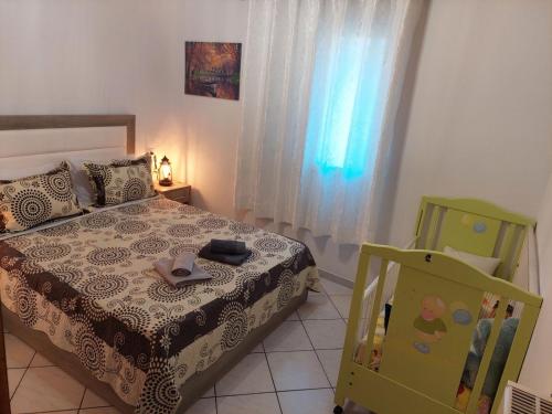 Postel nebo postele na pokoji v ubytování Bellissimo house