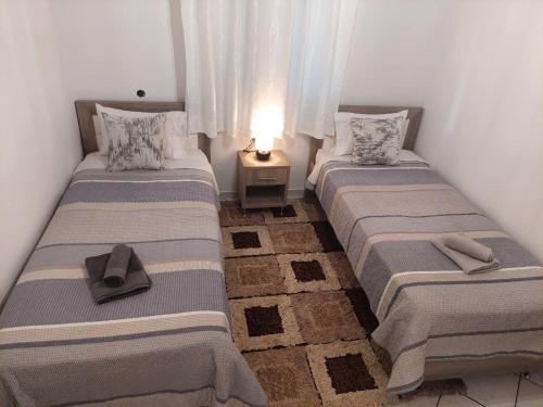 Postel nebo postele na pokoji v ubytování Bellissimo house