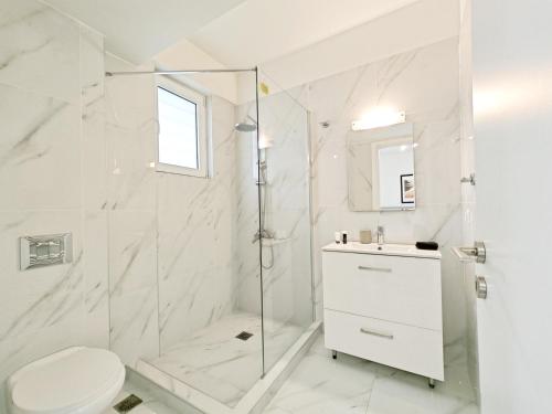 Ένα μπάνιο στο Kapodistriou by Verde Apartments