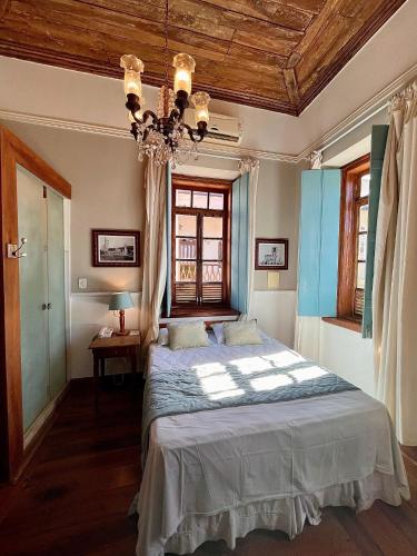 Katil atau katil-katil dalam bilik di Hotel Vila Nova do Príncipe