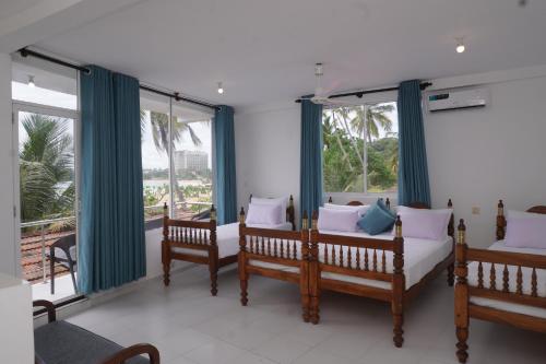 Zona de estar de SURF UNA BEACH HOTEL
