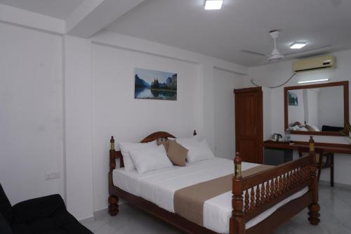 Cama o camas de una habitación en SURF UNA BEACH HOTEL