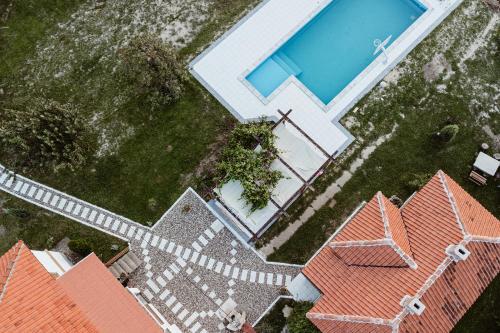 an aerial view of a house with a swimming pool at Uzivancija in Lazarevac