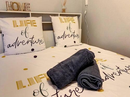 Кровать или кровати в номере Le Florentin - Hyper centre