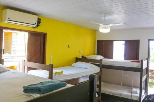 Una cama o camas en una habitación de KM Hostel