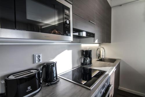 Dapur atau dapur kecil di Vuokatti Booking Suites