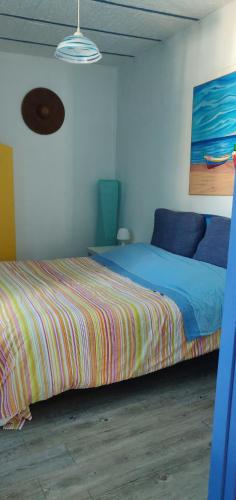 A bed or beds in a room at La Casa di Chico
