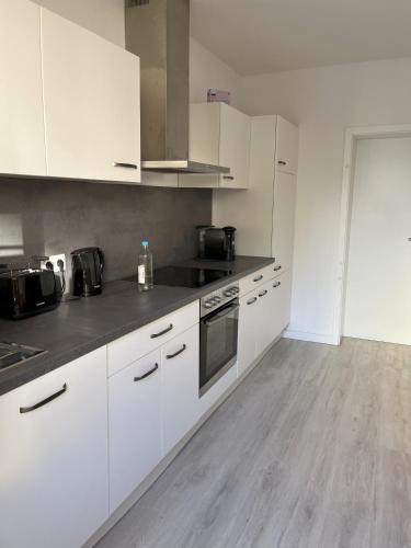 Een keuken of kitchenette bij Handwerker-Herberge