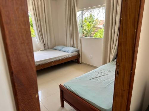 Postel nebo postele na pokoji v ubytování Casa sítio