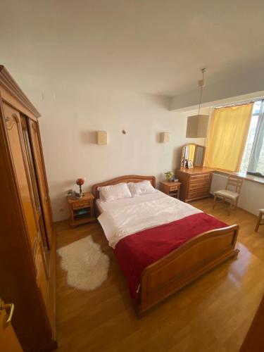 Un pat sau paturi într-o cameră la Apartament in centrul orasului - Unirii Fântânii