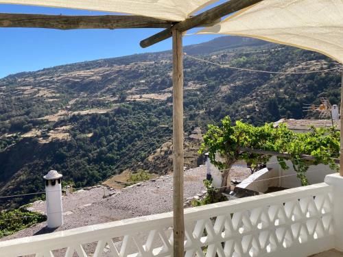 a view from the balcony of a house at Casa Tradicional Alpujarreña in Capileira