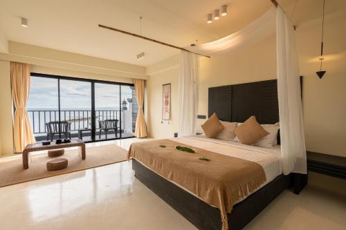 Postel nebo postele na pokoji v ubytování Samaya Wellness Resort