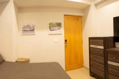 Postel nebo postele na pokoji v ubytování Apartamento Céntrico en Santo Domingo 4G