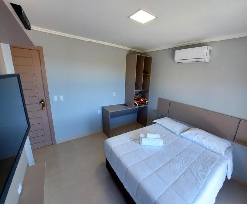 Cama ou camas em um quarto em Hotel Du Rastro