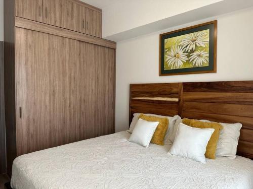 Giường trong phòng chung tại Casa AMAR i LLA 3 Lagos - Centrica