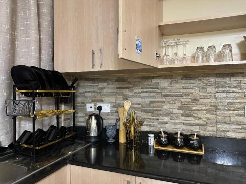 Dapur atau dapur kecil di Winlee Suites