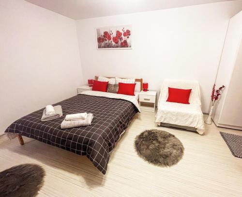 Ένα ή περισσότερα κρεβάτια σε δωμάτιο στο BUZZ Apartment