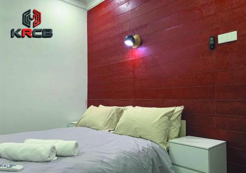 Ένα ή περισσότερα κρεβάτια σε δωμάτιο στο KRCB Corner Lot Holiday Home Kajang