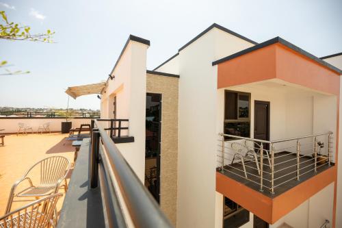 a view of the balcony of a house at Executive Two Bedroom Apartment in Accra in Accra
