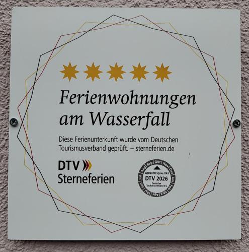 a flyer for a derwijnen am wasgemen am westerfall at Ferienwohnungen am Wasserfall in Bad Urach