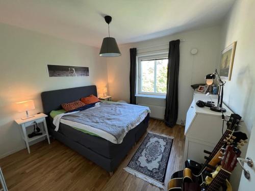 Ένα ή περισσότερα κρεβάτια σε δωμάτιο στο Private room in a shared apartment