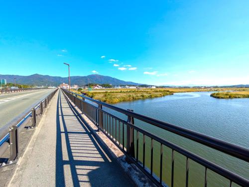 a bridge over a river on a highway at Plaza Hotel Nogata in Nōgata
